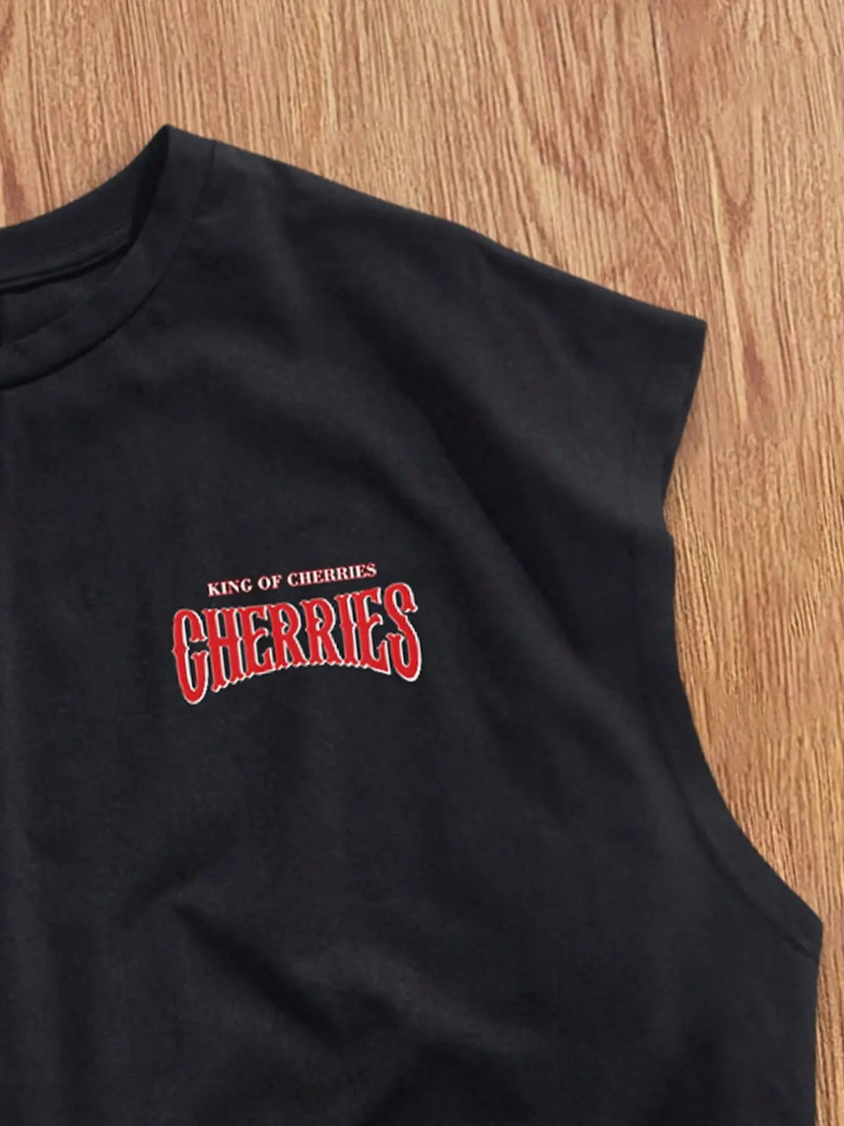 Men's Vest: An oversized, cropped, wide-shoulder silhouette featuring a simple yet casual cherry motif. Versatile enough to be worn alone or layered, making it perfect for vacation, daily wear, or commuting—a true wardrobe staple, Graphic Tops